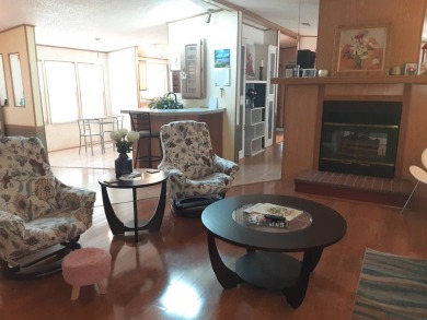 This waterfront 1792 sq ft 3 bedroom manufactured home is in 55+ on Schalamar Creek Golf and Country Club in Florida - for sale on GolfHomes.com, golf home, golf lot