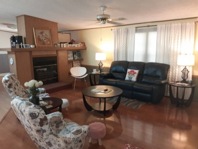 This waterfront 1792 sq ft 3 bedroom manufactured home is in 55+ on Schalamar Creek Golf and Country Club in Florida - for sale on GolfHomes.com, golf home, golf lot