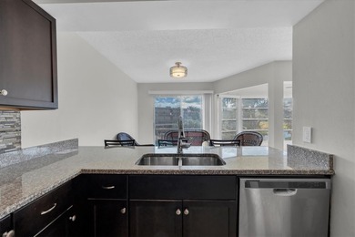 This charming, 2-bedroom, 2-bath condo is located in the very on East Bay Golf Club in Florida - for sale on GolfHomes.com, golf home, golf lot