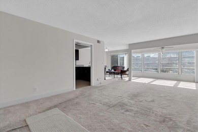 This charming, 2-bedroom, 2-bath condo is located in the very on East Bay Golf Club in Florida - for sale on GolfHomes.com, golf home, golf lot