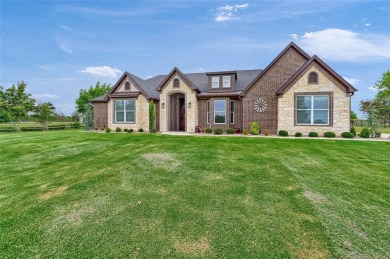 Located near the charming city of Denison, TX, 31 Golf Walk Cir on Denison Country Club in Texas - for sale on GolfHomes.com, golf home, golf lot