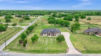 Located near the charming city of Denison, TX, 31 Golf Walk Cir on Denison Country Club in Texas - for sale on GolfHomes.com, golf home, golf lot