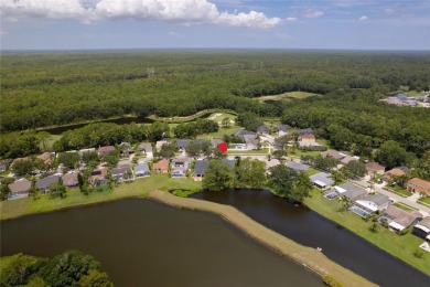 One or more photo(s) has been virtually staged. Showstopper Home on The Eagles Golf Course and Club in Florida - for sale on GolfHomes.com, golf home, golf lot