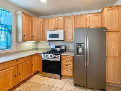 Welcome to 19642 Castle Harbor Court, a beautifully maintained on Ashwood Golf Course in California - for sale on GolfHomes.com, golf home, golf lot