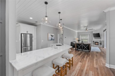 One or more photo(s) has been virtually staged. Showstopper Home on The Eagles Golf Course and Club in Florida - for sale on GolfHomes.com, golf home, golf lot