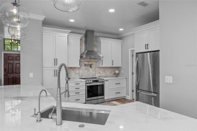 One or more photo(s) has been virtually staged. Showstopper Home on The Eagles Golf Course and Club in Florida - for sale on GolfHomes.com, golf home, golf lot