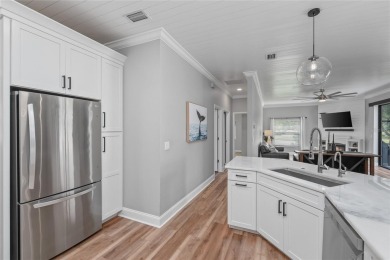 One or more photo(s) has been virtually staged. Showstopper Home on The Eagles Golf Course and Club in Florida - for sale on GolfHomes.com, golf home, golf lot