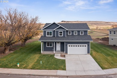 Experience elevated living in this stunning new construction on Buffalo Peak Golf Course in Oregon - for sale on GolfHomes.com, golf home, golf lot