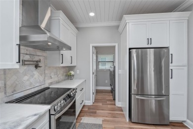 One or more photo(s) has been virtually staged. Showstopper Home on The Eagles Golf Course and Club in Florida - for sale on GolfHomes.com, golf home, golf lot