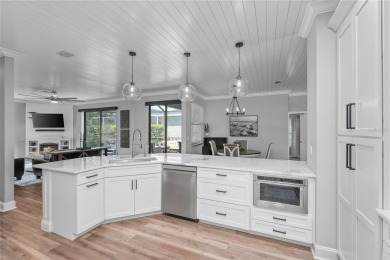 One or more photo(s) has been virtually staged. Showstopper Home on The Eagles Golf Course and Club in Florida - for sale on GolfHomes.com, golf home, golf lot