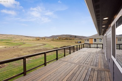 Experience elevated living in this stunning new construction on Buffalo Peak Golf Course in Oregon - for sale on GolfHomes.com, golf home, golf lot
