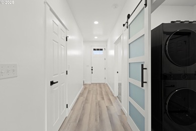 Experience elevated living in this stunning new construction on Buffalo Peak Golf Course in Oregon - for sale on GolfHomes.com, golf home, golf lot