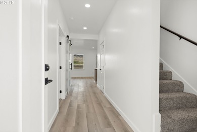 Experience elevated living in this stunning new construction on Buffalo Peak Golf Course in Oregon - for sale on GolfHomes.com, golf home, golf lot