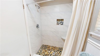 Welcome to this beautifully remodeled 3-bed, 2-bath home in the on Brunswick Country Club in Georgia - for sale on GolfHomes.com, golf home, golf lot