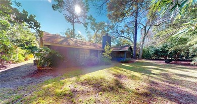 Welcome to this beautifully remodeled 3-bed, 2-bath home in the on Brunswick Country Club in Georgia - for sale on GolfHomes.com, golf home, golf lot