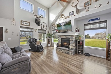 Golf course living with a massive RV garage and breathtaking on Clear Lake Country Club in Idaho - for sale on GolfHomes.com, golf home, golf lot