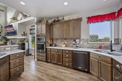 Golf course living with a massive RV garage and breathtaking on Clear Lake Country Club in Idaho - for sale on GolfHomes.com, golf home, golf lot