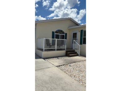 This 2001 Jacobsen fully furnished home offers 2 bedrooms, 2 on Sabal Springs Golf and Racquet Club in Florida - for sale on GolfHomes.com, golf home, golf lot