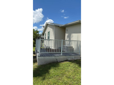 This 2001 Jacobsen fully furnished home offers 2 bedrooms, 2 on Sabal Springs Golf and Racquet Club in Florida - for sale on GolfHomes.com, golf home, golf lot