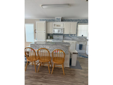 This 2001 Jacobsen fully furnished home offers 2 bedrooms, 2 on Sabal Springs Golf and Racquet Club in Florida - for sale on GolfHomes.com, golf home, golf lot