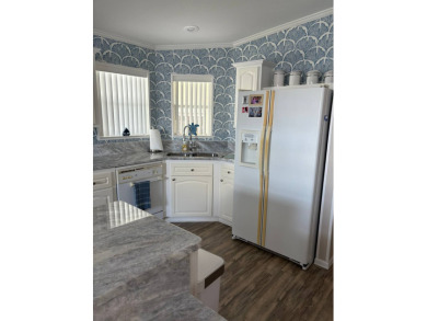 This 2001 Jacobsen fully furnished home offers 2 bedrooms, 2 on Sabal Springs Golf and Racquet Club in Florida - for sale on GolfHomes.com, golf home, golf lot
