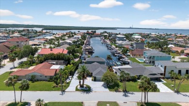 Picture yourself in a tropical oasis, where lush landscapes and on Gulf Harbors Golf Course in Florida - for sale on GolfHomes.com, golf home, golf lot