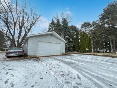 Nestled in the heart of Amery, Wisconsin, this charming home on The Amery Golf Club in Wisconsin - for sale on GolfHomes.com, golf home, golf lot