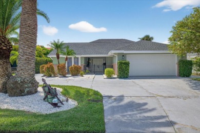 Picture yourself in a tropical oasis, where lush landscapes and on Gulf Harbors Golf Course in Florida - for sale on GolfHomes.com, golf home, golf lot