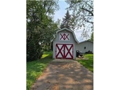 Nestled in the heart of Amery, Wisconsin, this charming home on The Amery Golf Club in Wisconsin - for sale on GolfHomes.com, golf home, golf lot