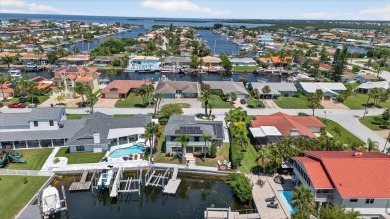 Picture yourself in a tropical oasis, where lush landscapes and on Gulf Harbors Golf Course in Florida - for sale on GolfHomes.com, golf home, golf lot