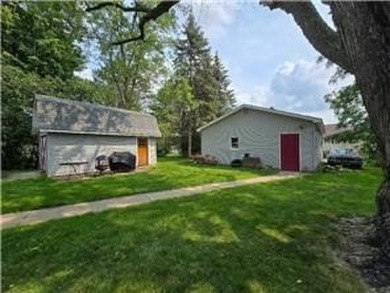 Nestled in the heart of Amery, Wisconsin, this charming home on The Amery Golf Club in Wisconsin - for sale on GolfHomes.com, golf home, golf lot