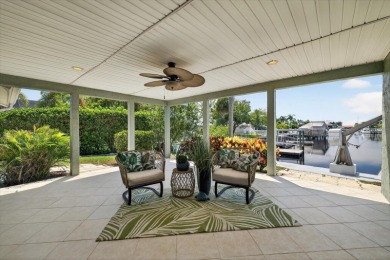 Picture yourself in a tropical oasis, where lush landscapes and on Gulf Harbors Golf Course in Florida - for sale on GolfHomes.com, golf home, golf lot