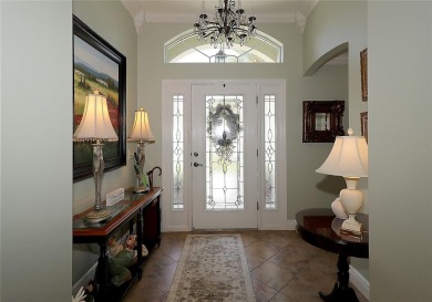 Welcome in to this gorgeous 3/2 Lantana with a golf cart garage on The Links of Spruce Creek in Florida - for sale on GolfHomes.com, golf home, golf lot