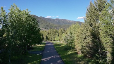 Nestled amidst the rugged beauty of Glacier Country lies a rare on Glacier View Golf Course in Montana - for sale on GolfHomes.com, golf home, golf lot