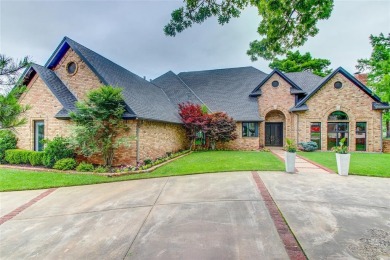 Welcome to a refined residence nestled on the prestigious west on Oak Tree National Golf and Country Club in Oklahoma - for sale on GolfHomes.com, golf home, golf lot