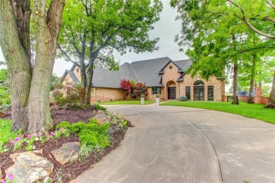 Welcome to a refined residence nestled on the prestigious west on Oak Tree National Golf and Country Club in Oklahoma - for sale on GolfHomes.com, golf home, golf lot