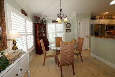 Welcome in to this gorgeous 3/2 Lantana with a golf cart garage on The Links of Spruce Creek in Florida - for sale on GolfHomes.com, golf home, golf lot