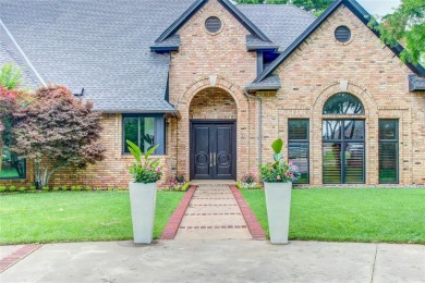 Welcome to a refined residence nestled on the prestigious west on Oak Tree National Golf and Country Club in Oklahoma - for sale on GolfHomes.com, golf home, golf lot