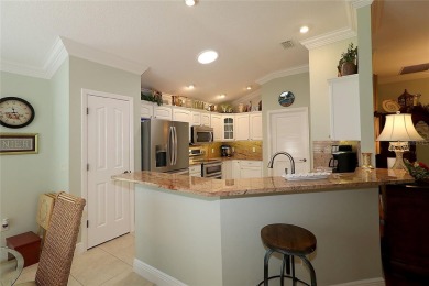 Welcome in to this gorgeous 3/2 Lantana with a golf cart garage on The Links of Spruce Creek in Florida - for sale on GolfHomes.com, golf home, golf lot
