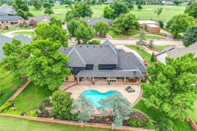 Welcome to a refined residence nestled on the prestigious west on Oak Tree National Golf and Country Club in Oklahoma - for sale on GolfHomes.com, golf home, golf lot