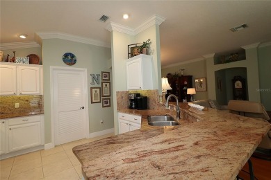 Welcome in to this gorgeous 3/2 Lantana with a golf cart garage on The Links of Spruce Creek in Florida - for sale on GolfHomes.com, golf home, golf lot