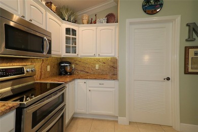 Welcome in to this gorgeous 3/2 Lantana with a golf cart garage on The Links of Spruce Creek in Florida - for sale on GolfHomes.com, golf home, golf lot