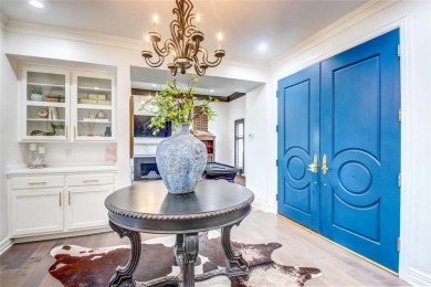 Welcome to a refined residence nestled on the prestigious west on Oak Tree National Golf and Country Club in Oklahoma - for sale on GolfHomes.com, golf home, golf lot