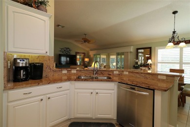 Welcome in to this gorgeous 3/2 Lantana with a golf cart garage on The Links of Spruce Creek in Florida - for sale on GolfHomes.com, golf home, golf lot