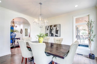 Welcome to a refined residence nestled on the prestigious west on Oak Tree National Golf and Country Club in Oklahoma - for sale on GolfHomes.com, golf home, golf lot