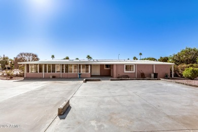 Great corner lot stuccoed 2 bedroom 1.75 furnished home on Fountain of the Sun Country Club in Arizona - for sale on GolfHomes.com, golf home, golf lot