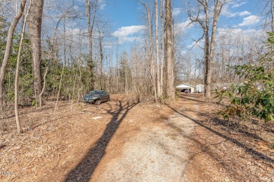 Beautiful 1.84 Acre Golf Course Wooded Lot convenient to on Occoneechee Golf Club in North Carolina - for sale on GolfHomes.com, golf home, golf lot