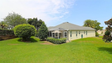 Welcome in to this gorgeous 3/2 Lantana with a golf cart garage on The Links of Spruce Creek in Florida - for sale on GolfHomes.com, golf home, golf lot