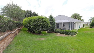 Welcome in to this gorgeous 3/2 Lantana with a golf cart garage on The Links of Spruce Creek in Florida - for sale on GolfHomes.com, golf home, golf lot