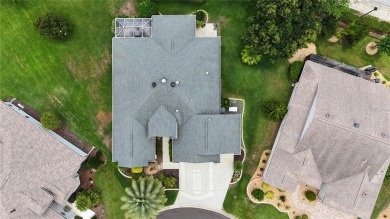 Welcome in to this gorgeous 3/2 Lantana with a golf cart garage on The Links of Spruce Creek in Florida - for sale on GolfHomes.com, golf home, golf lot